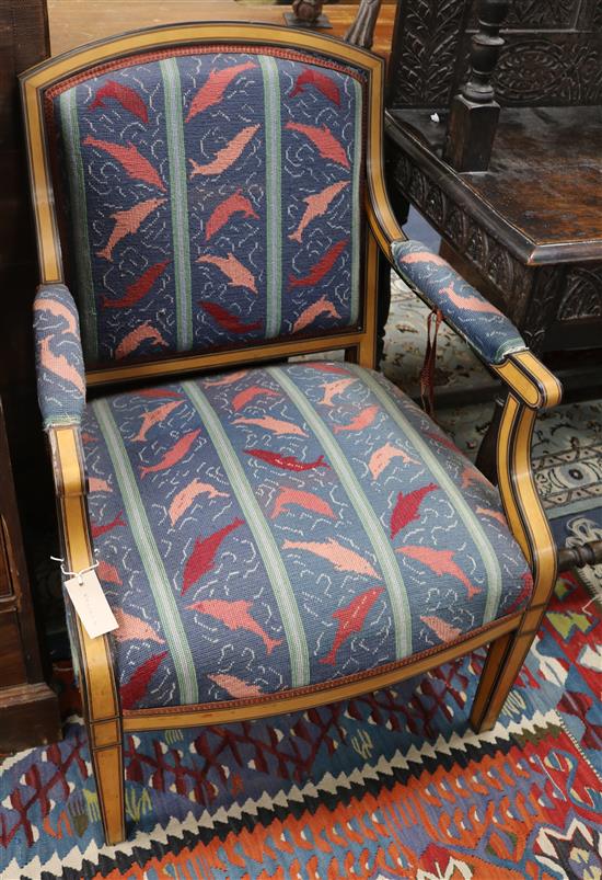 An unusual 19th century banded harewood open armchair